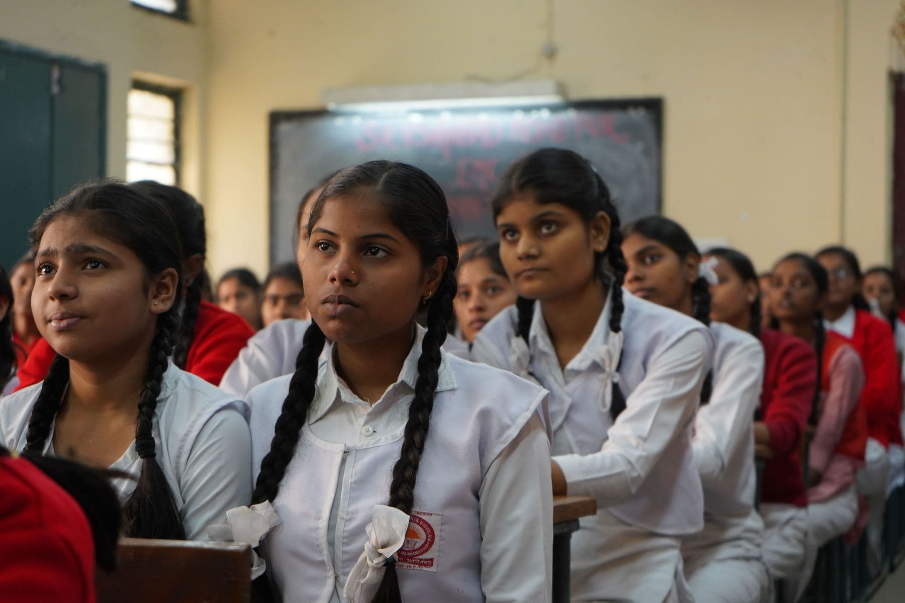 College students listening in a classroom