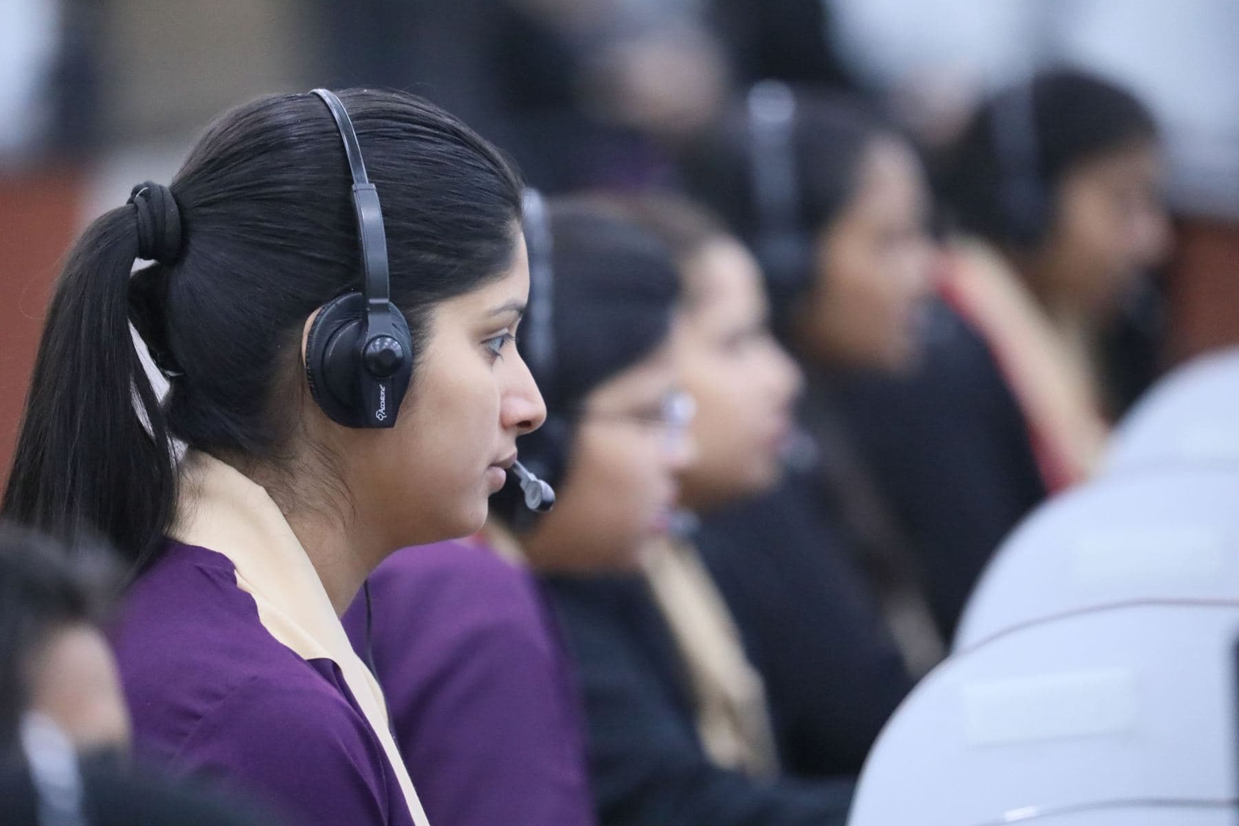 A telecaller wearing a headset