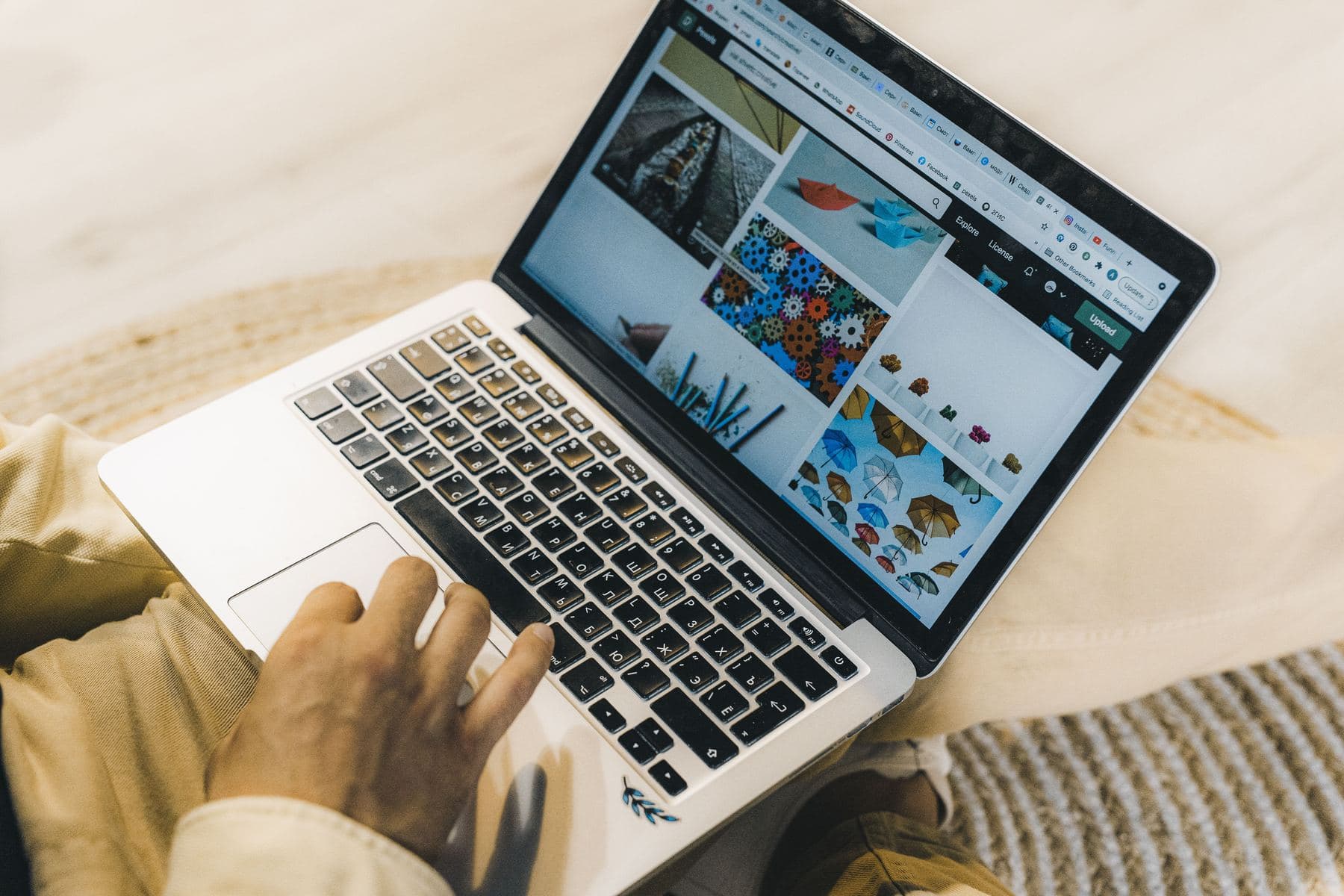 Someone browsing a website on a laptop